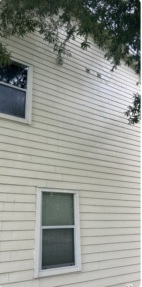 House siding bright and clean after pressure washing